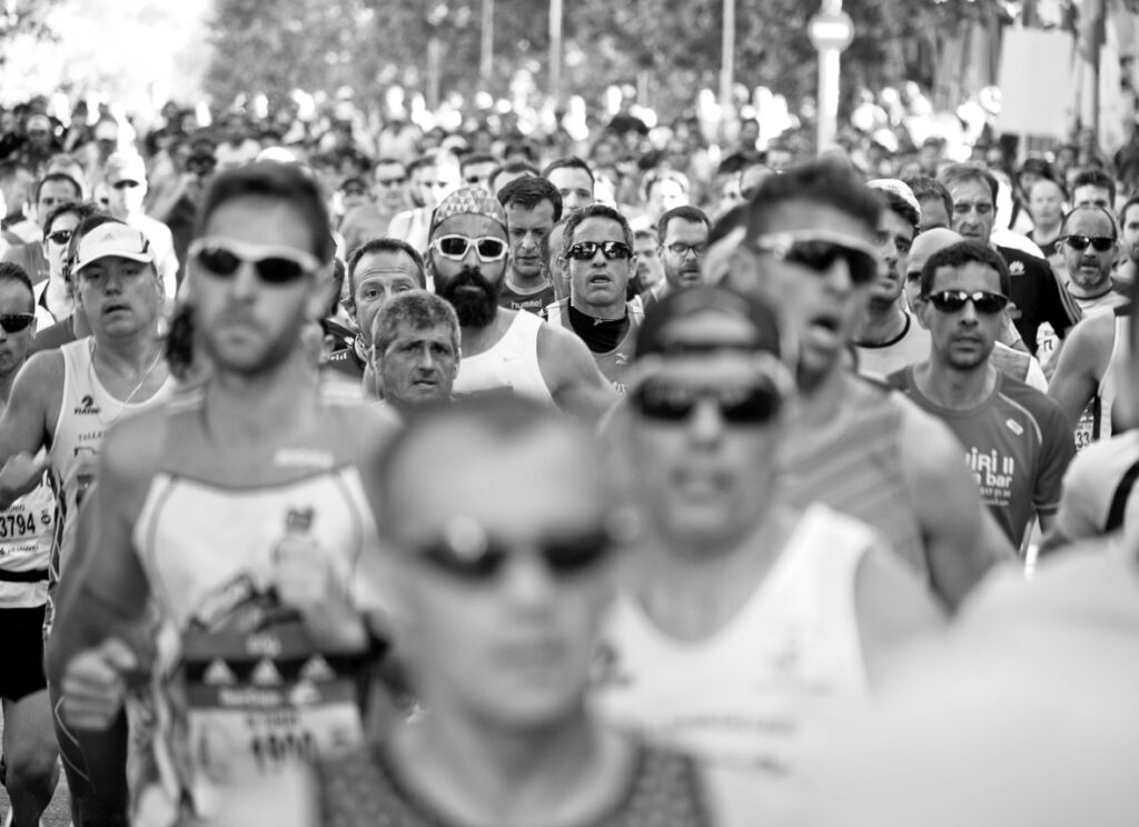 A sea of people running in a summer marathon.